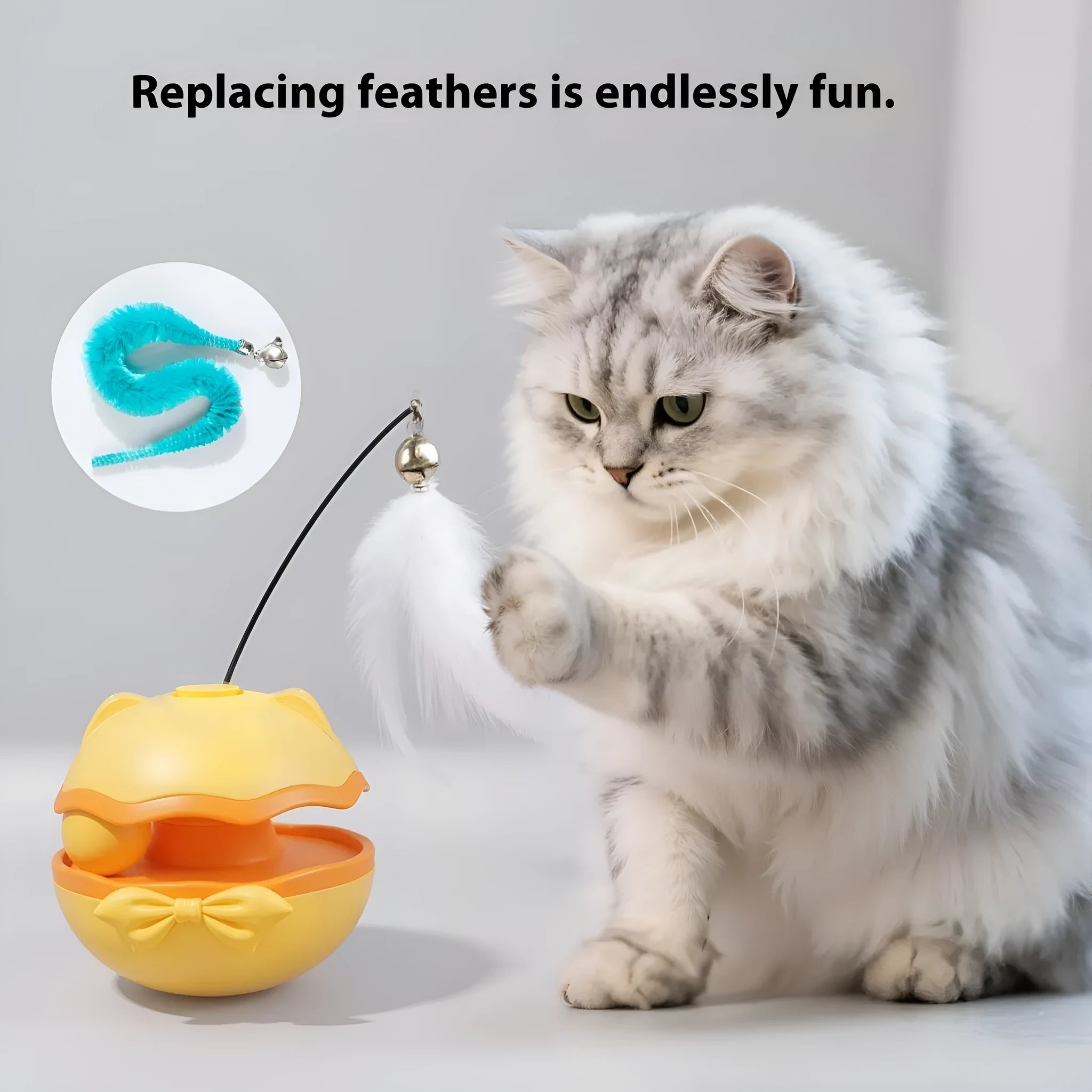 Electric cat toy tumbler ball in soft fog grey colour, showing smooth plastic surface and on/off switch on base.