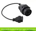 OBD2 adapter cable with BMW 20-pin connector and standard 16-pin OBD2 connector for vehicle diagnostics.
