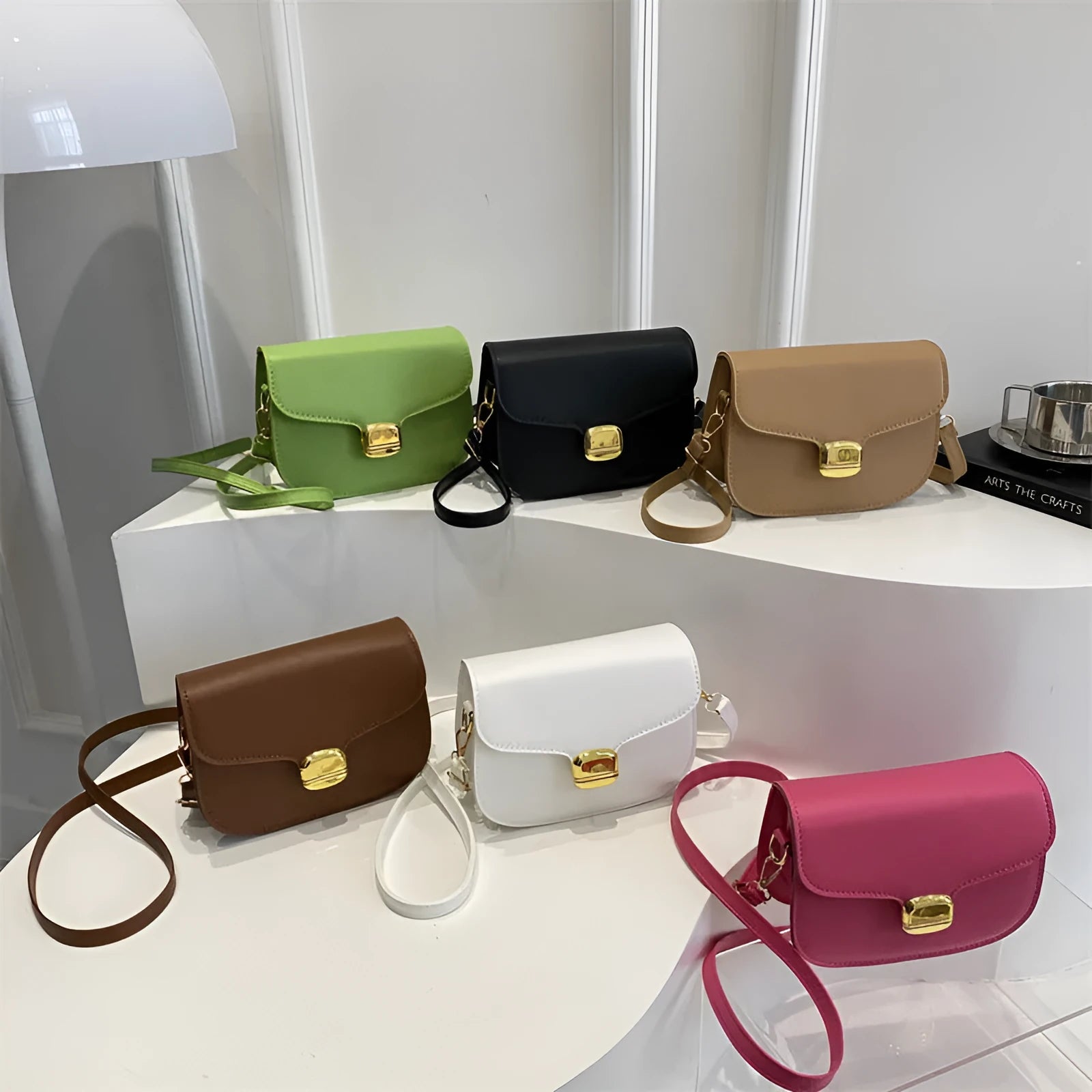 Simple PU leather women's handbag showing interior zipper coin compartment and phone pocket.