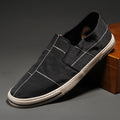 Men's low-top slip-on canvas casual trainers in multiple colours on a white background