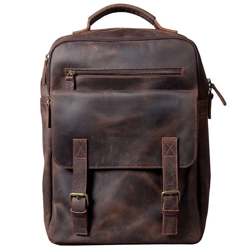 Dark coffee coloured handmade leather backpack with internal organiser compartments.
