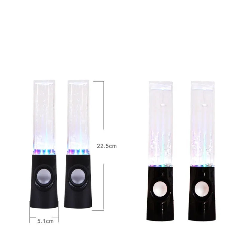 Wireless dancing water speaker with LED light fountain showing colourful water column and dual speakers on a desk
