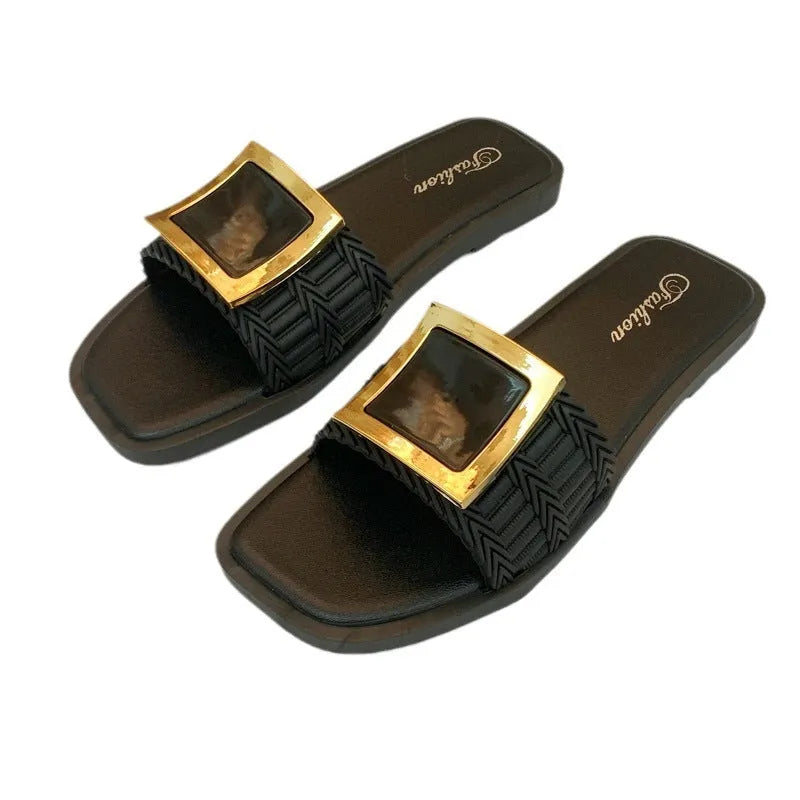 Women's apricot coloured flat summer slippers with a textured PVC sole.