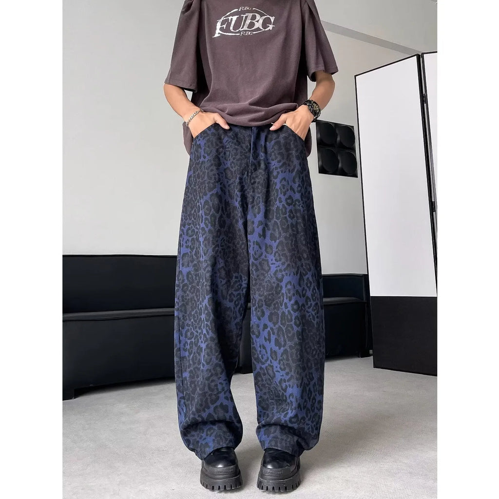 Blue cotton leopard print wide-leg pants with zip fly, full-length view