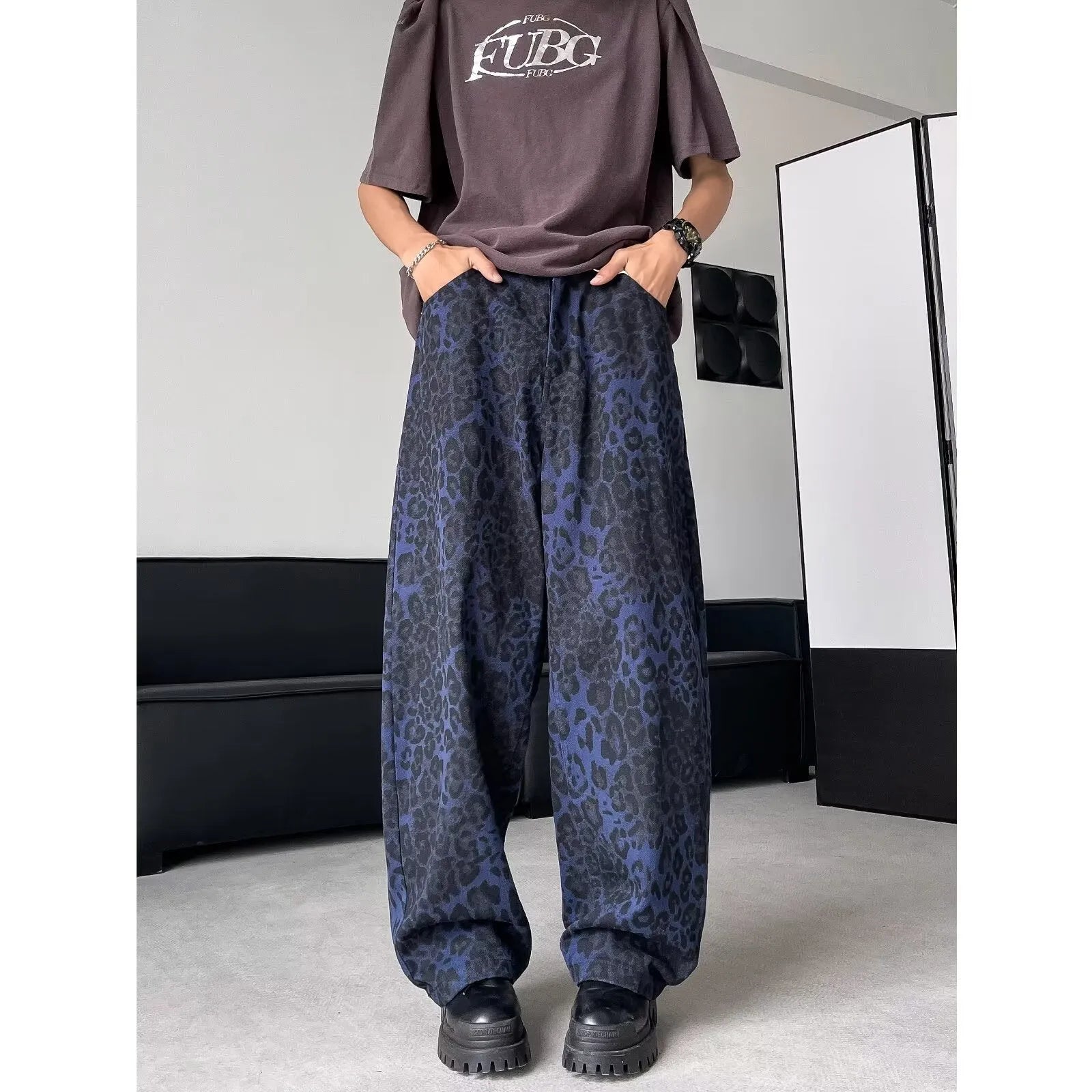 Blue cotton leopard print wide-leg pants with zip fly, full-length view
