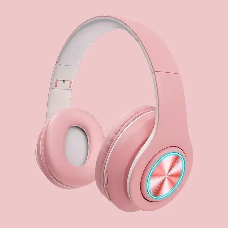 Wireless Bluetooth headset in five colour options showing head-mounted design with stereo earpieces