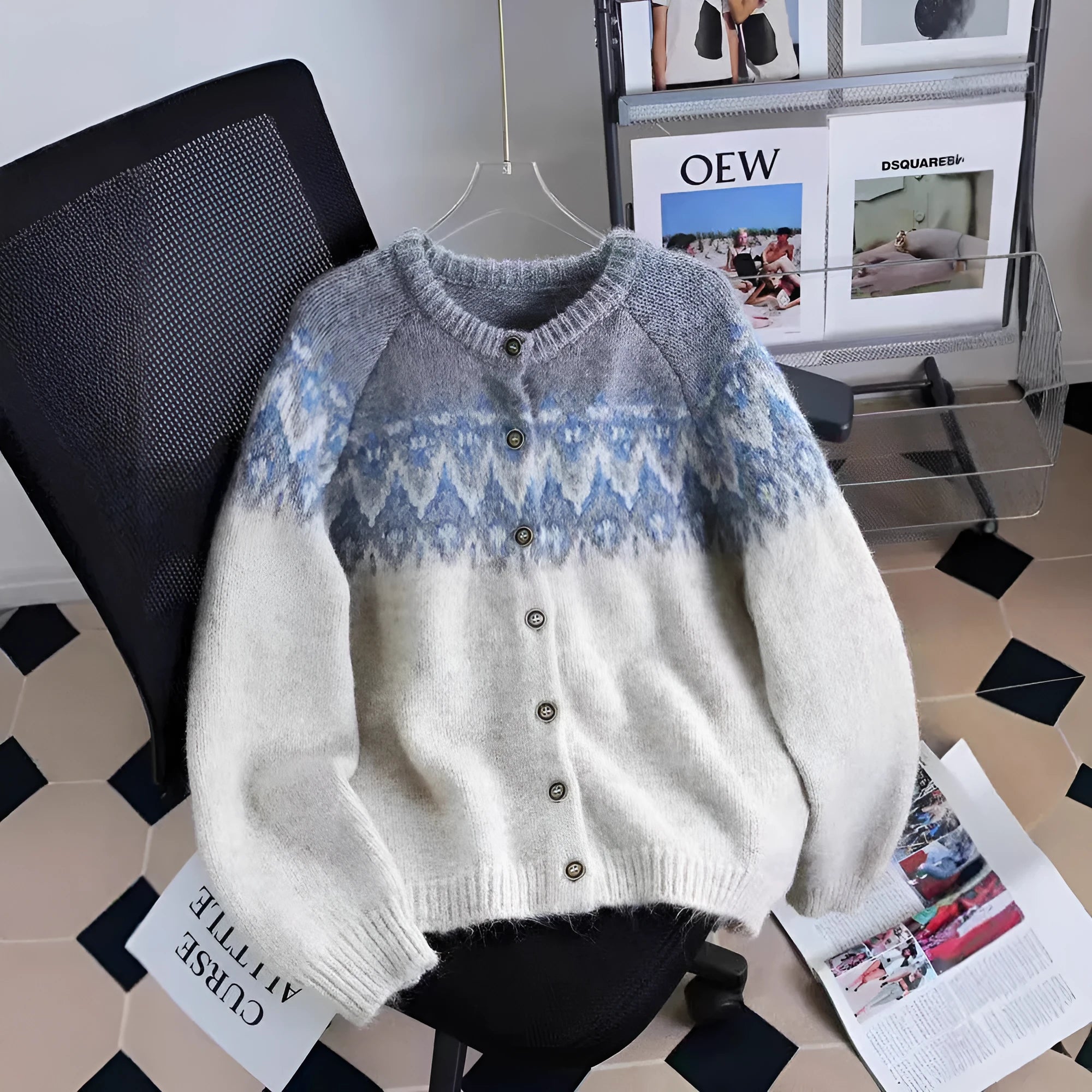 Women's beige jacquard patterned thick knit sweater coat with a loose fit and long sleeves.