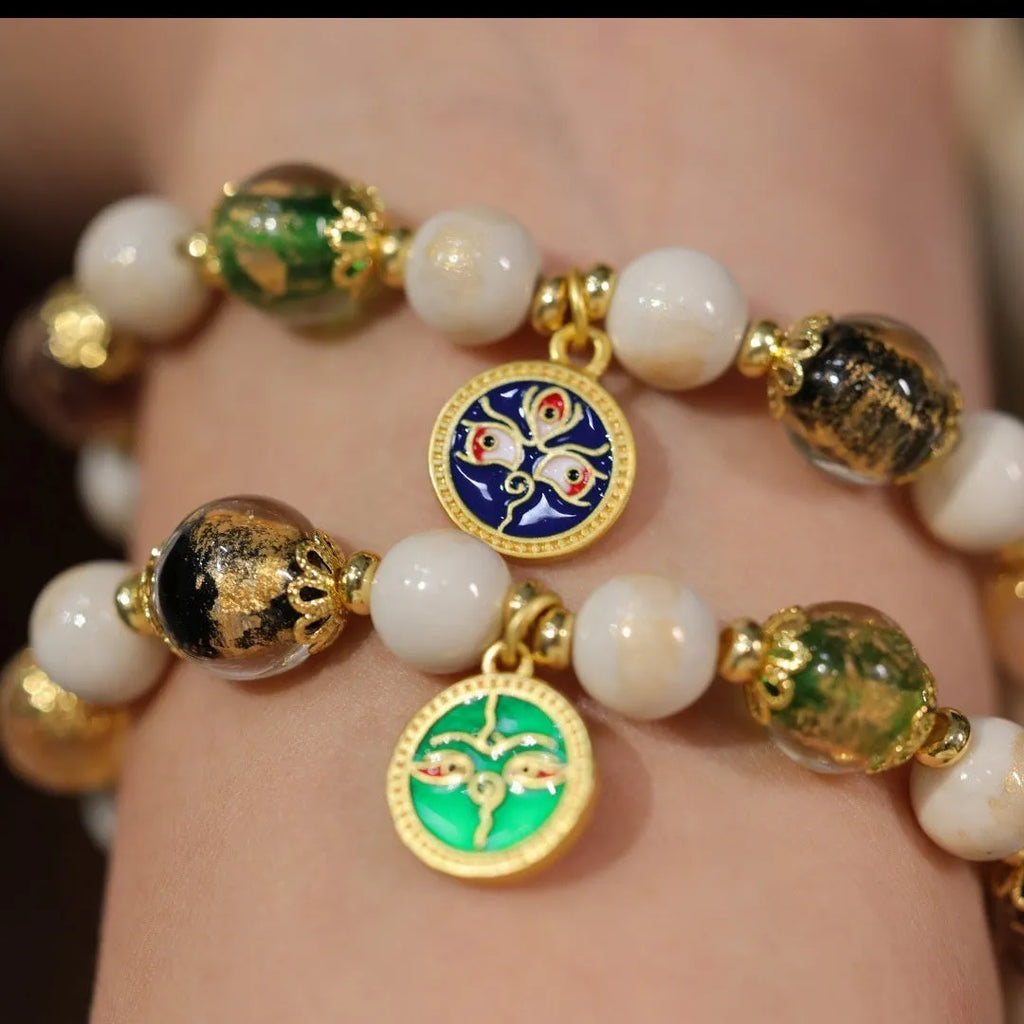 Handmade coloured glaze bracelet with 10mm glass beads showing gods of wealth motifs in national style design