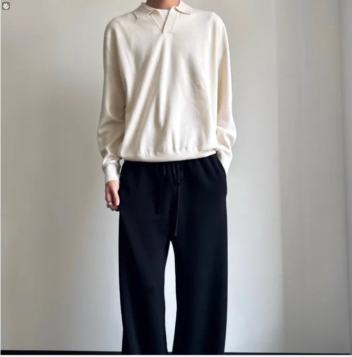 Pure wool polo sweater with lapel collar in loose fit, shown in milky white and navy blue.