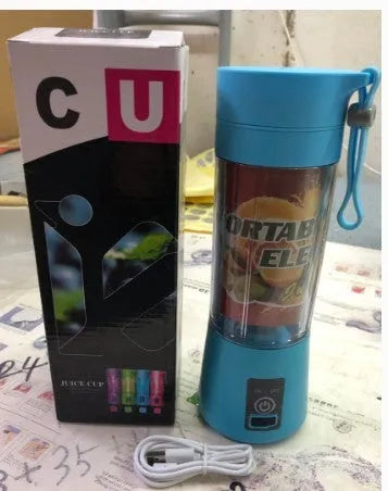 Mini USB electric fruit juicer with stainless steel blade in pink colour