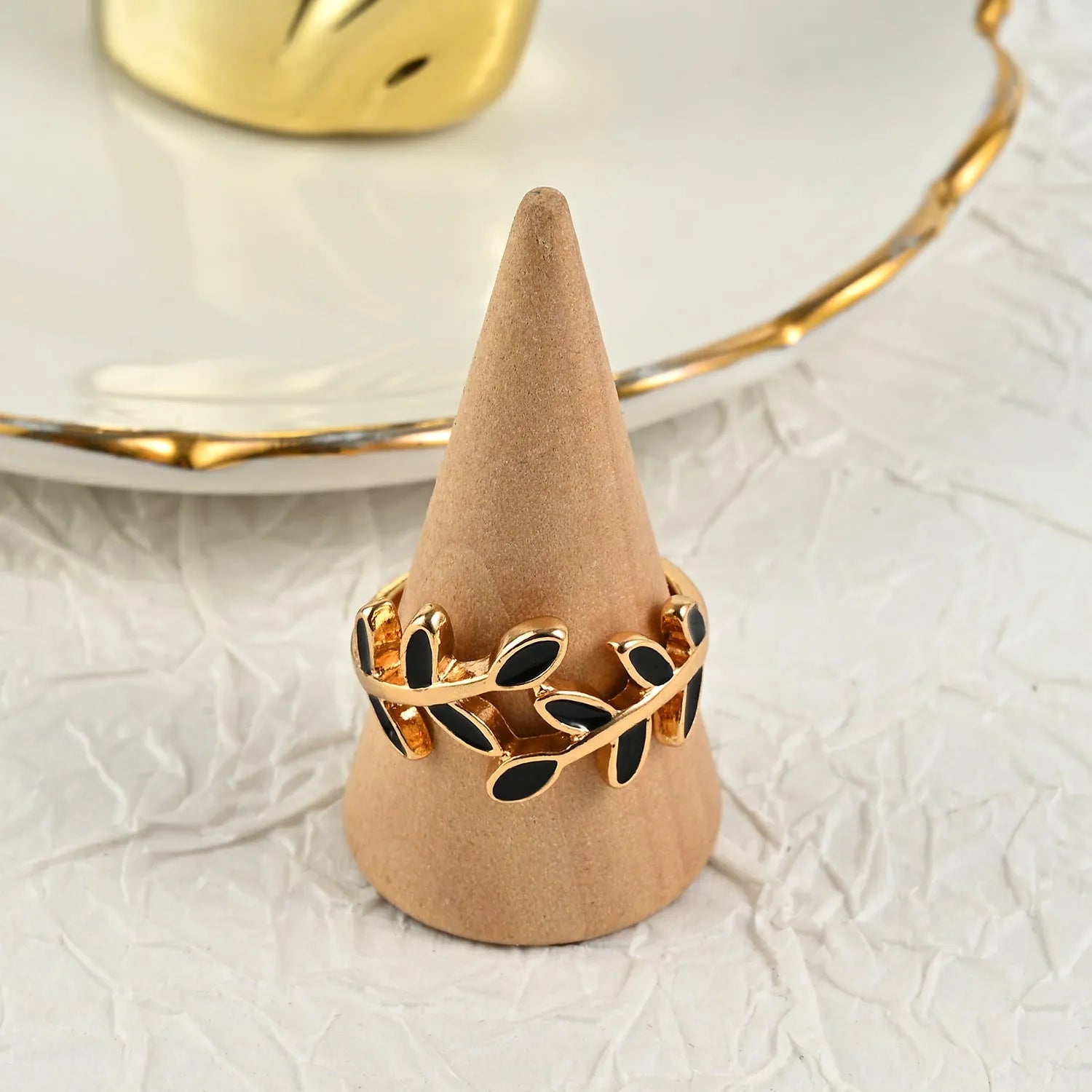 Gold geometric leaf design finger ring with floral elements and electroplated finish