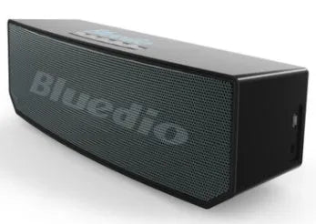 Black cloud smart speaker with compact design and micro-USB port.
