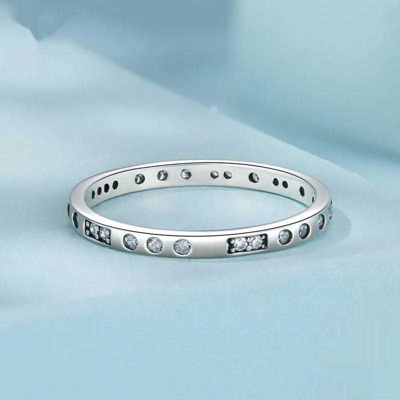 Silver coloured I Love You ring with oxidised black finish, simple bracelet band style.