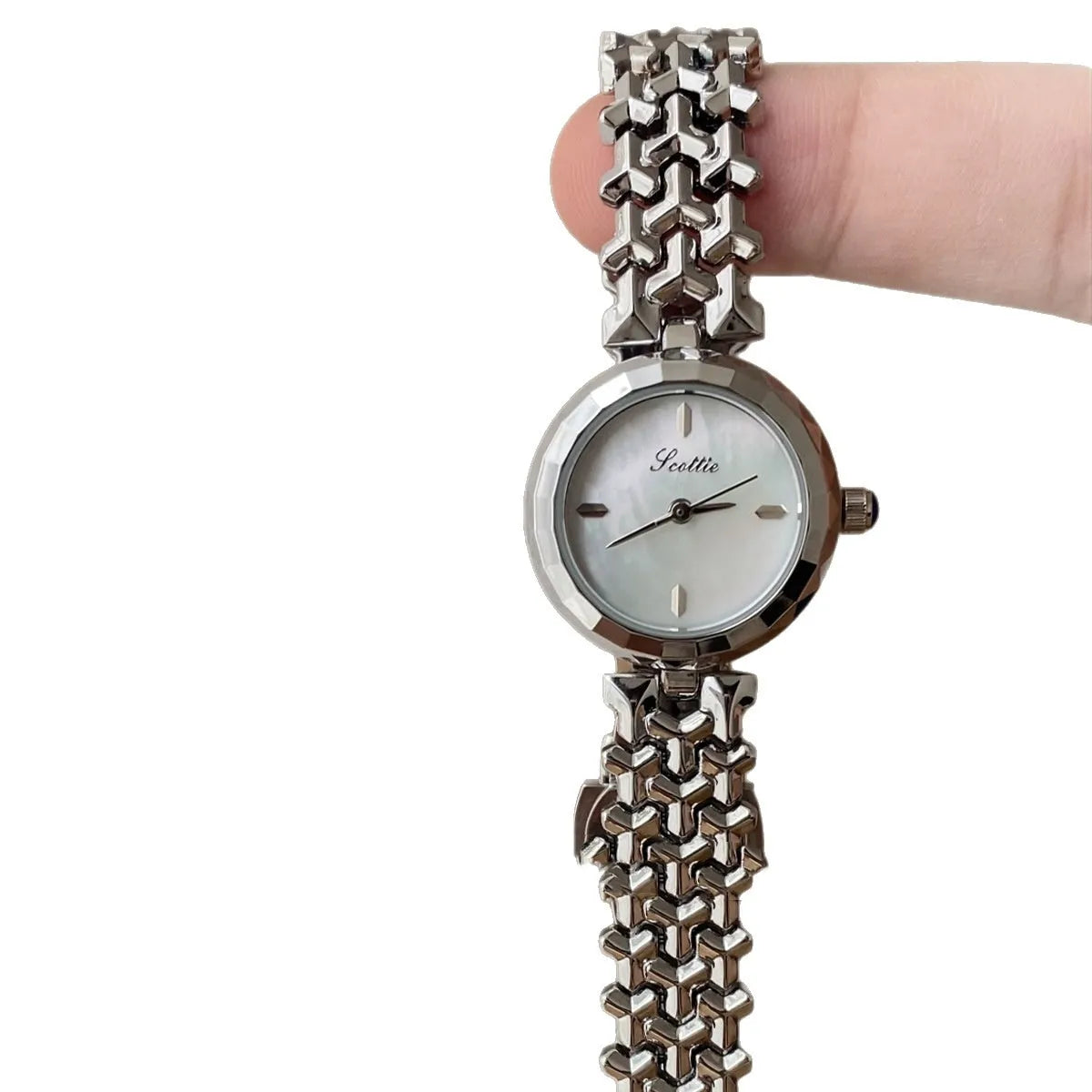Women's thin 8mm alloy watch with white shell dial and gold strap on wrist