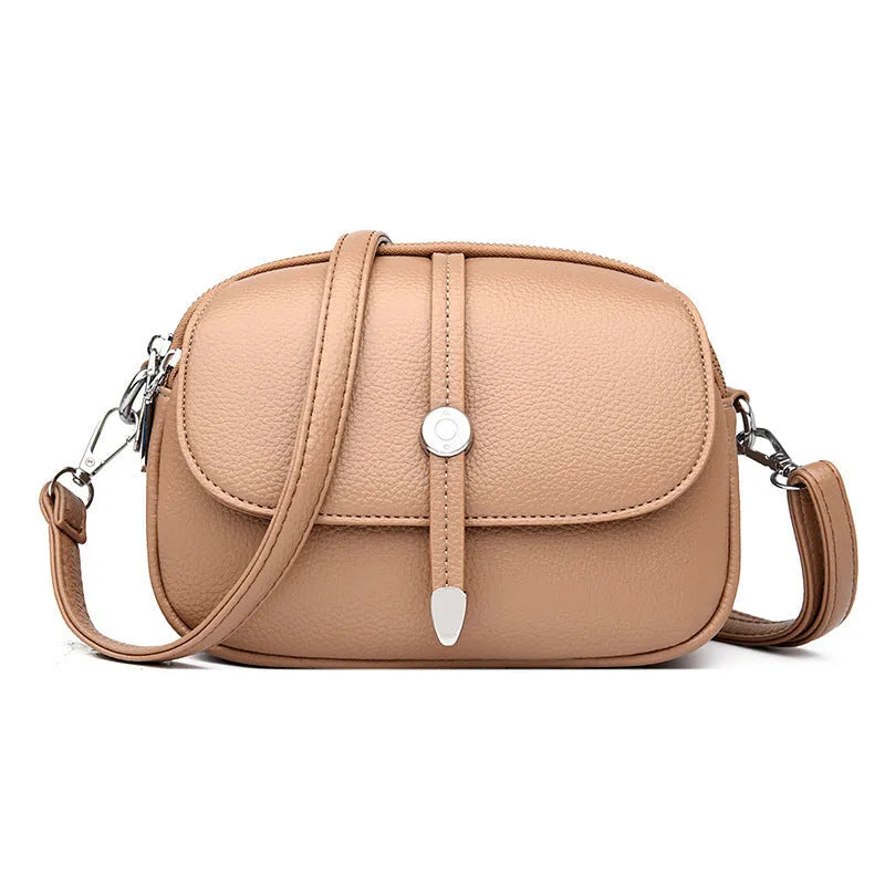 Women's soft PU leather crossbody shoulder bag oval shape in black khaki dark brown colours