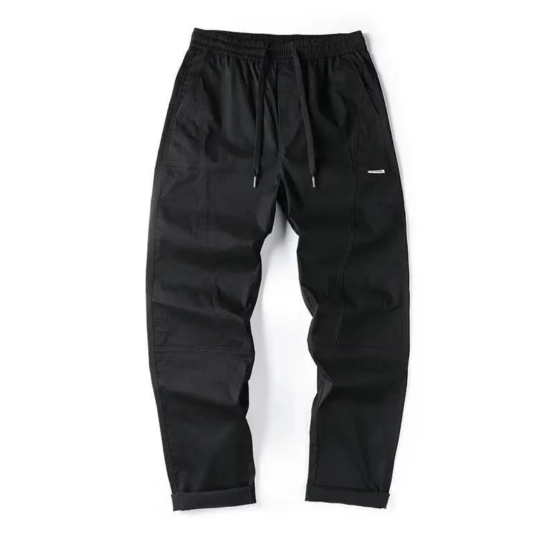Cotton wide-leg casual trousers with elasticated waistband in black and milky white colours