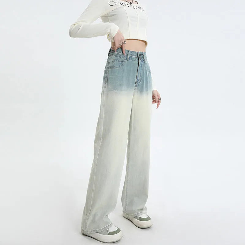 Women's wide-leg straight-cut denim trousers in a gradient blue colour wash.