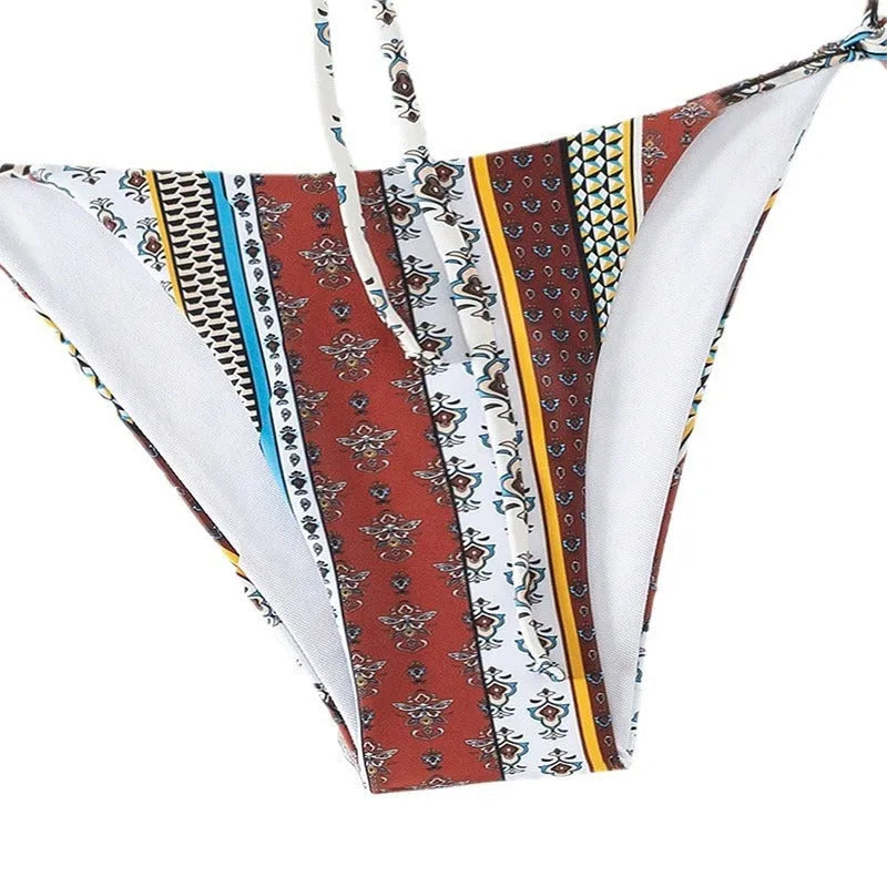 Women's mixed colour printed swimsuit with lace-up front detail, showing sleeveless top and bottom.