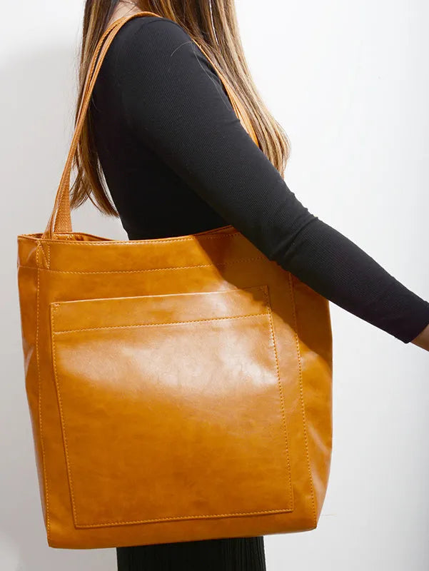 Retro large capacity shoulder bag with big pocket in oil wax leather-look PU, size 36x14x41cm, available in multiple colours.