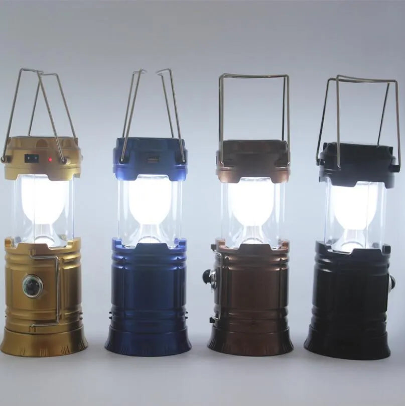 Collapsible LED solar camping lantern in Blue or Gold with reflective lenses, rubber handle and water resistant ABS body