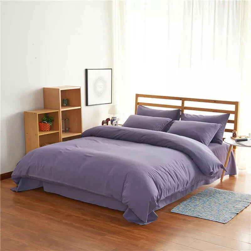 Four-piece polyester bedding set in a modern style for a 2m bed, shown in a choice of colours.