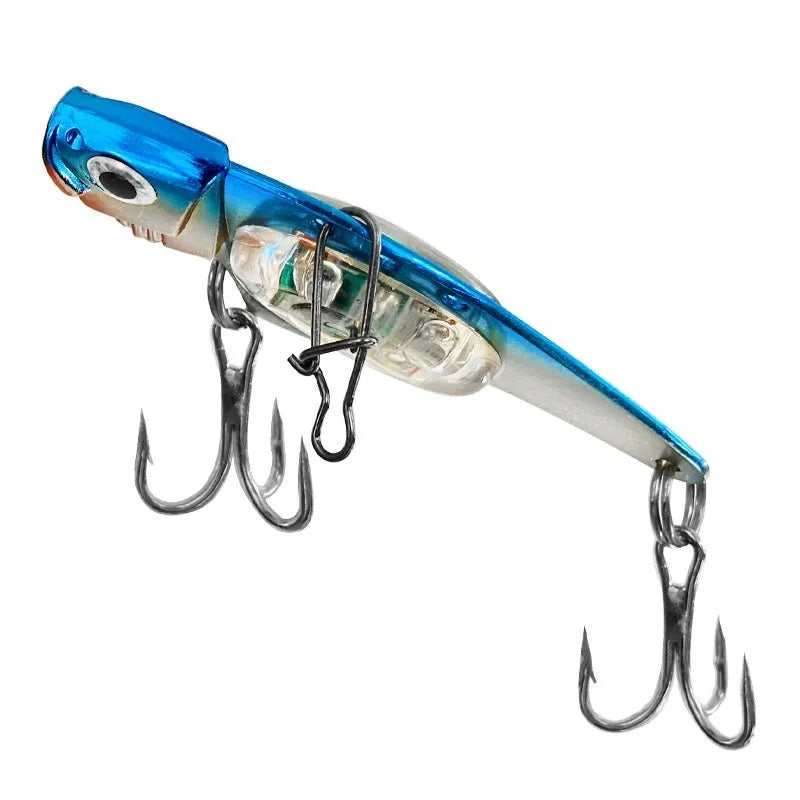 Metal Vib electronic fishing lure with luminous body in blue and red colour options
