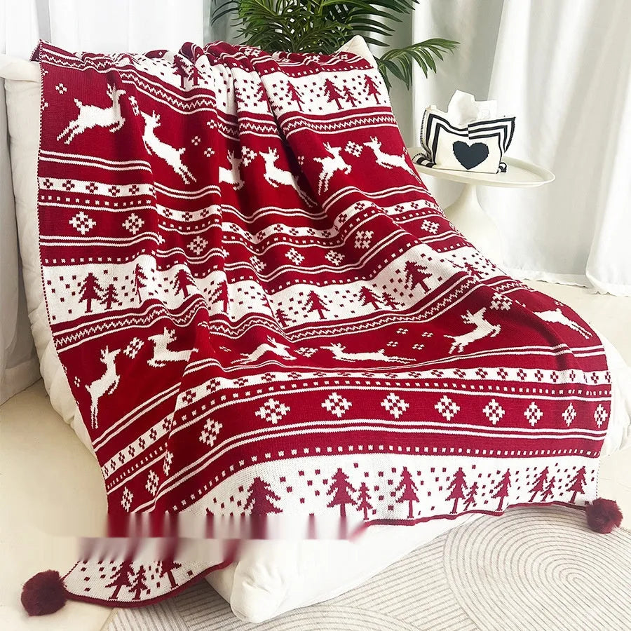 Personalised acrylic Christmas blanket with reindeer or snowflake print in two size options.