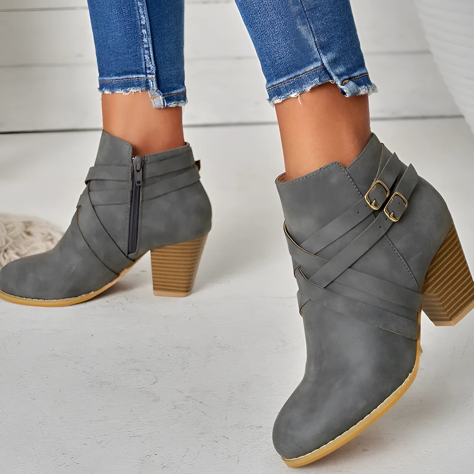Women's black PU leather short boots with a side zipper and a 7cm thick chunky heel.