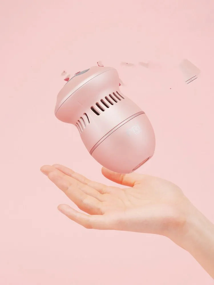 Beige electric foot file grinder with vacuum system and USB charging cable