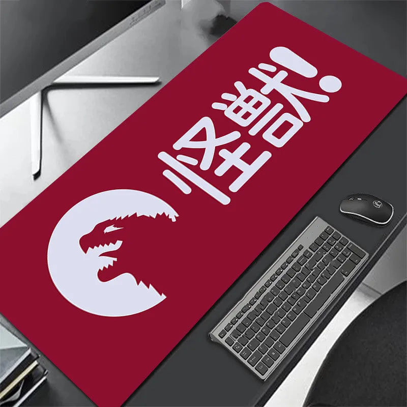 All black extra long mouse pad with precision overlock stitching on a desk