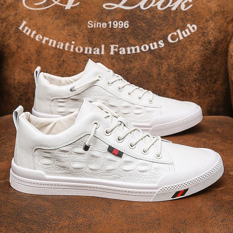 Men's white lace-up casual sneakers with round toe and flat rubber sole.