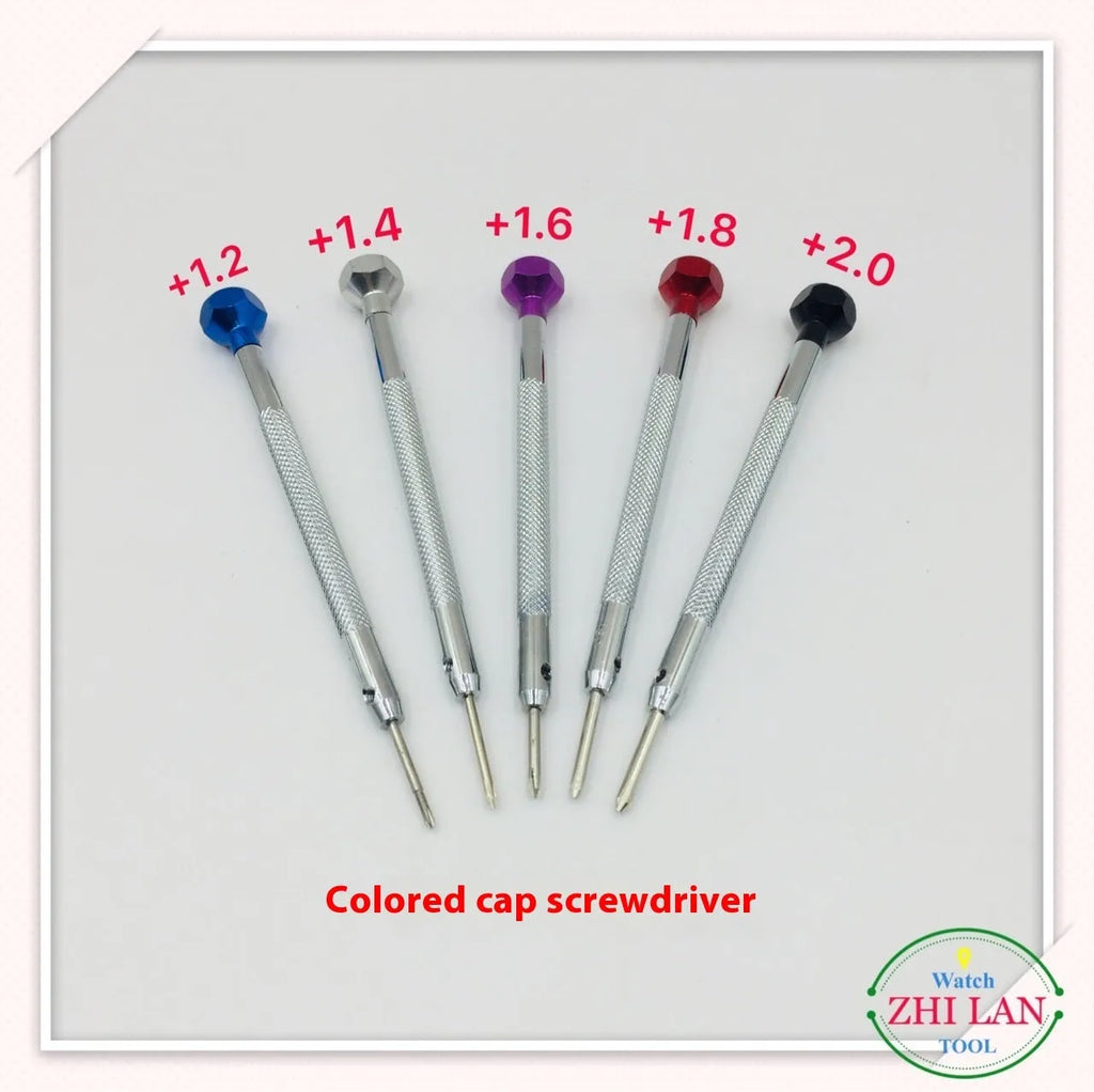 Six watch repair screwdrivers with coloured aluminium handles and copper grips for precision timepiece maintenance