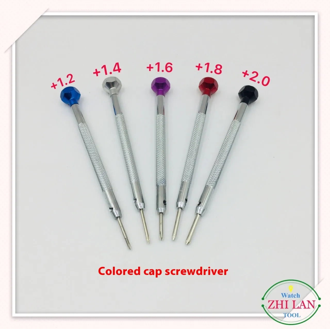 Six watch repair screwdrivers with coloured aluminium handles and copper grips for precision timepiece maintenance