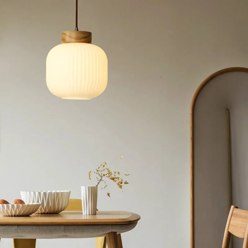 Retro Nordic style wooden pendant light with three size options and neutral, warm, or white light colours