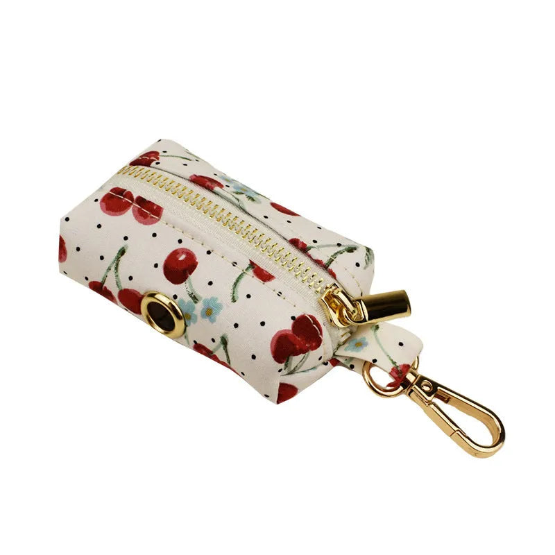 Red cherry print dog collar and leash set with light gold buckle and detachable bow strap