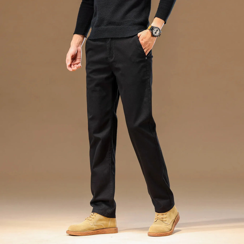 Men's cotton denim straight leg pencil trousers in black, mid waist zip fly, relaxed fit flat lay
