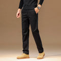 Men's cotton denim straight leg pencil trousers in black, mid waist zip fly, relaxed fit flat lay
