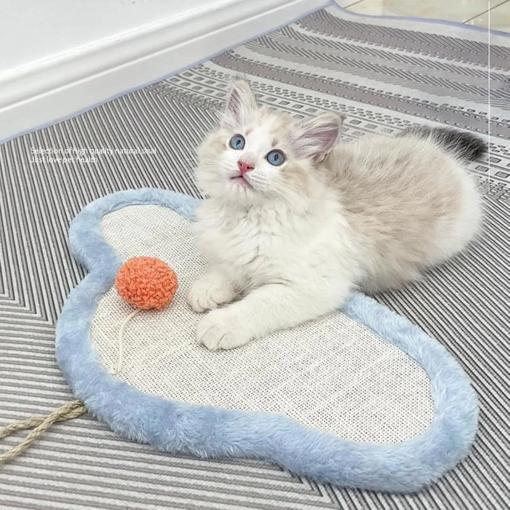 White cat scratching mat with cartoon cat design, made from natural sisal.