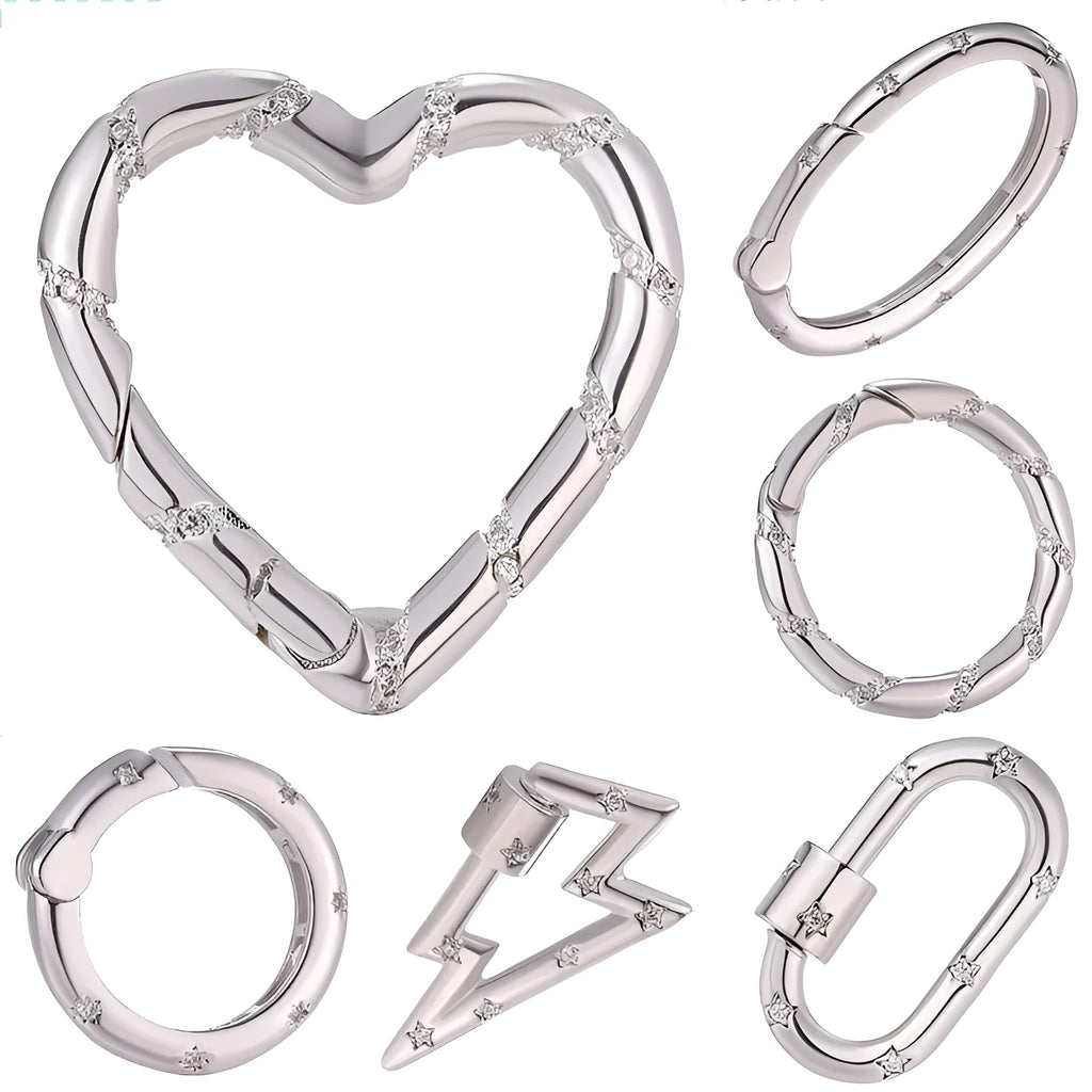 Copper climbing buckle with electroplated gold finish, shown as a heart spring fastener.