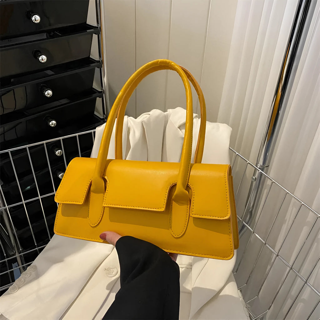 Women's black PU small square shoulder bag with single strap and stitching details