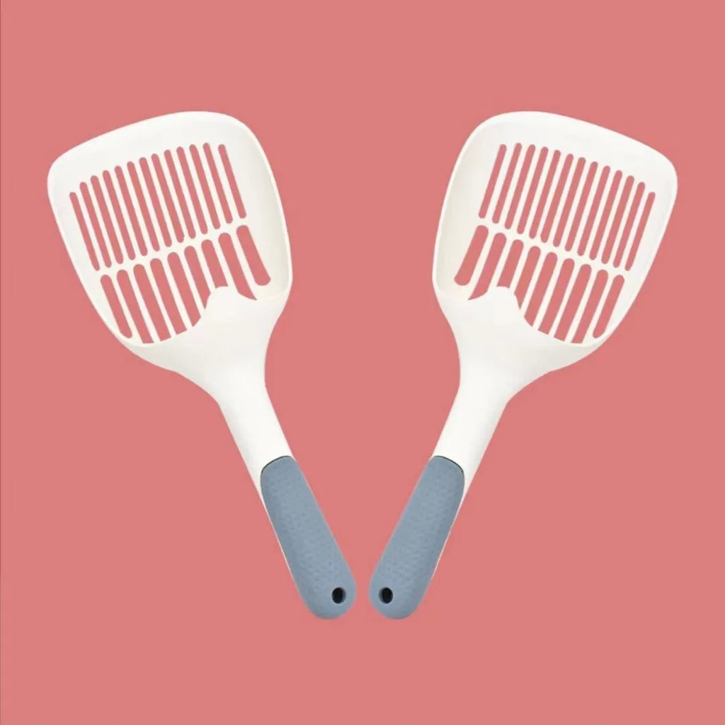 Large white plastic cat litter scoop with a deep bowl and multiple drainage holes.