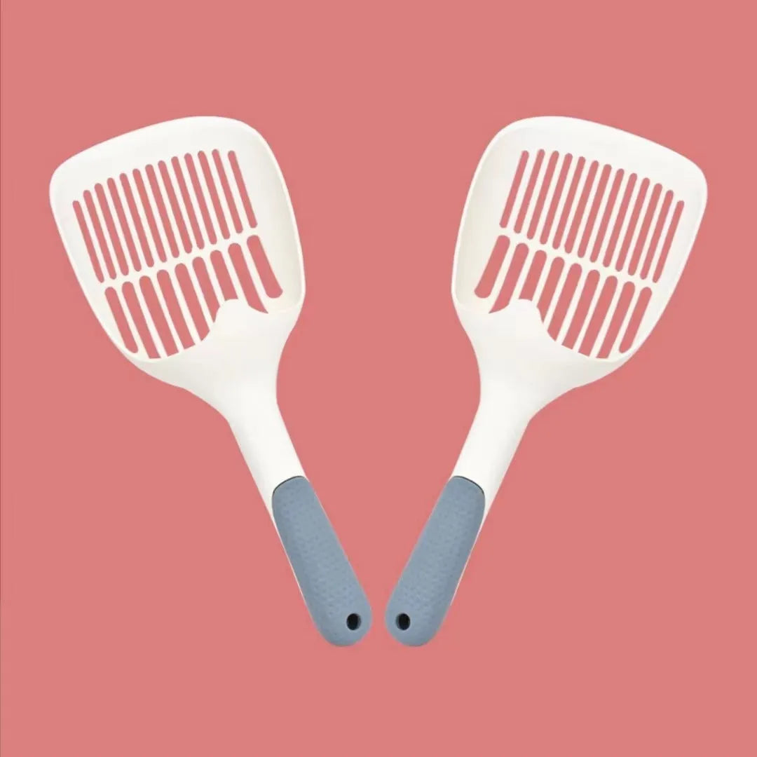 Large white plastic cat litter scoop with a deep bowl and multiple drainage holes.