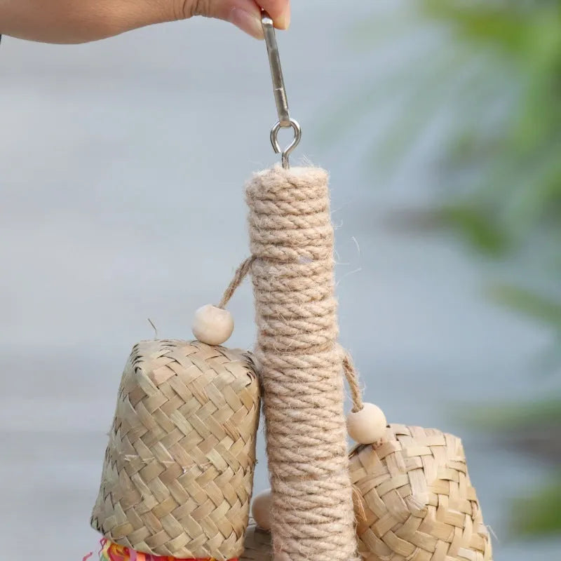 Colourful wooden shredded paper parrot chewing toy with sisal rope hanger
