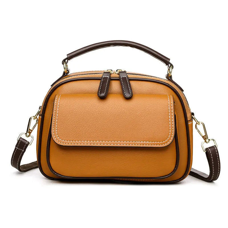 Women's black PU cross-body shoulder bag with square shape and adjustable double straps