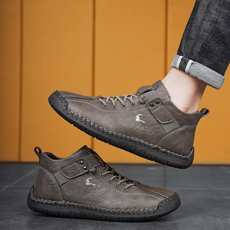 Men's casual sneakers in black with microfiber upper, rubber sole, lace-up front, and car stitching detail