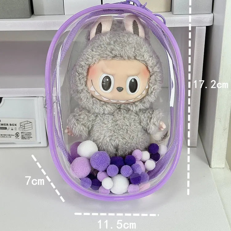 Transparent PVC cube storage bag with cartoon keychain and colourful ball in avocado green.