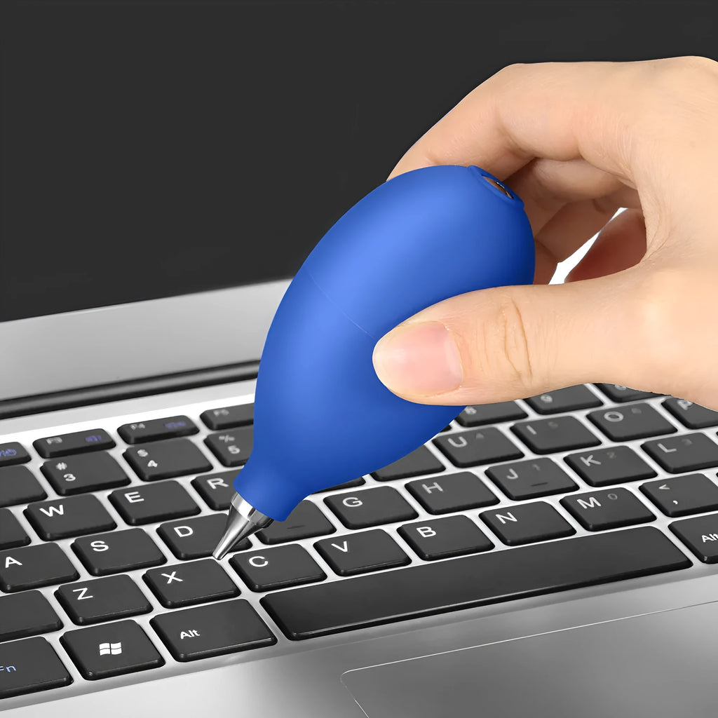 Blue and black rubber dust removal ball for cleaning cameras and mobile phones.