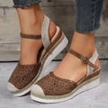 Women's beige platform wedge shoes with hemp rope detail on the wedge and a round toe.