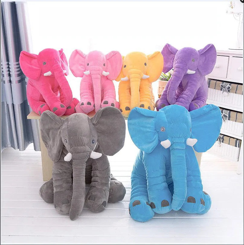 Soft grey elephant plush toy pillowcase for a child's bed.