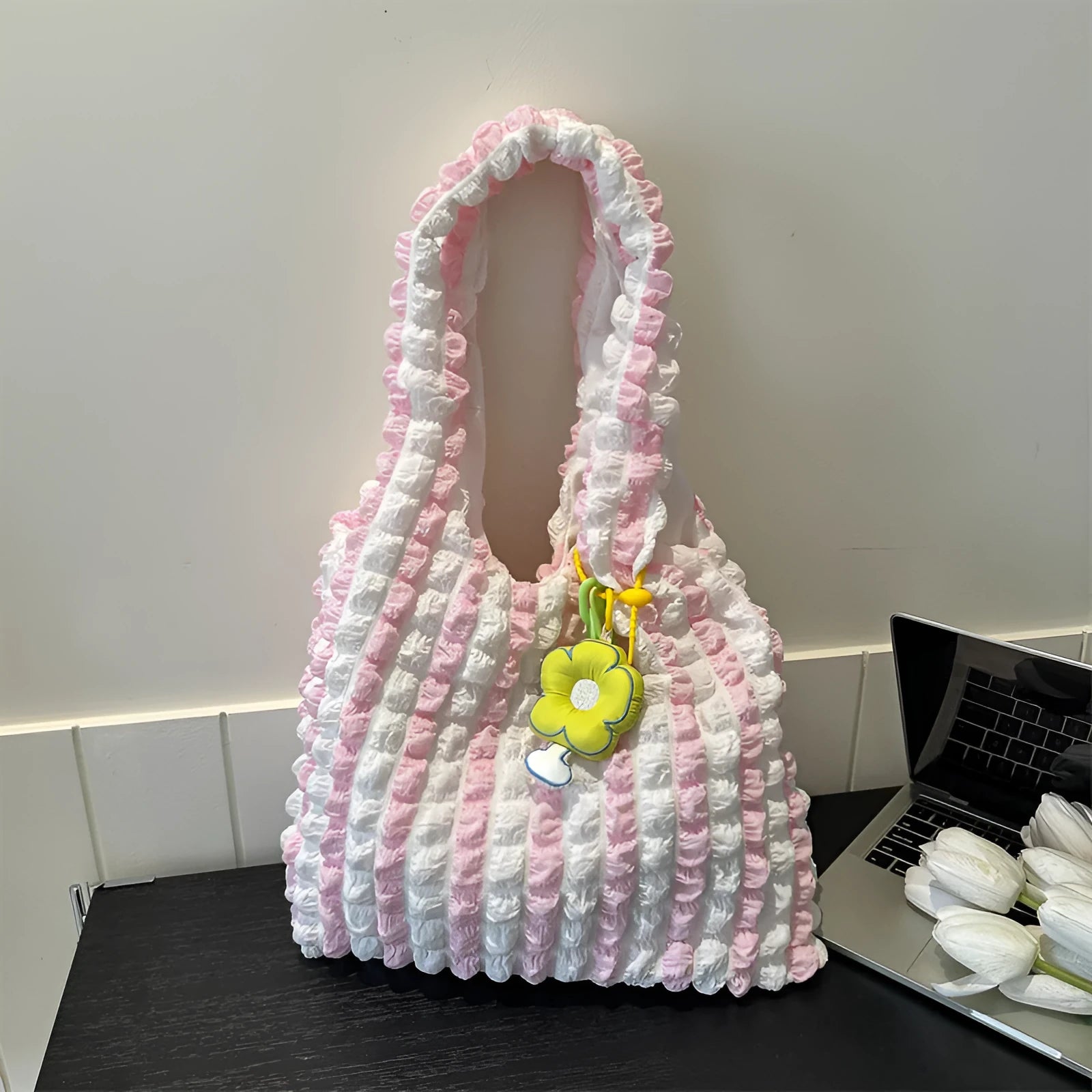 Soft pleated polyester women's crossbody bag in square shape with detachable pendant.